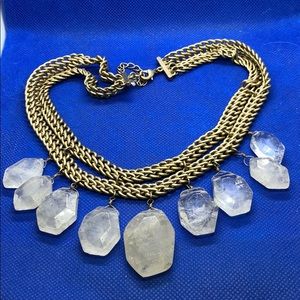 Gold and crystal necklace.